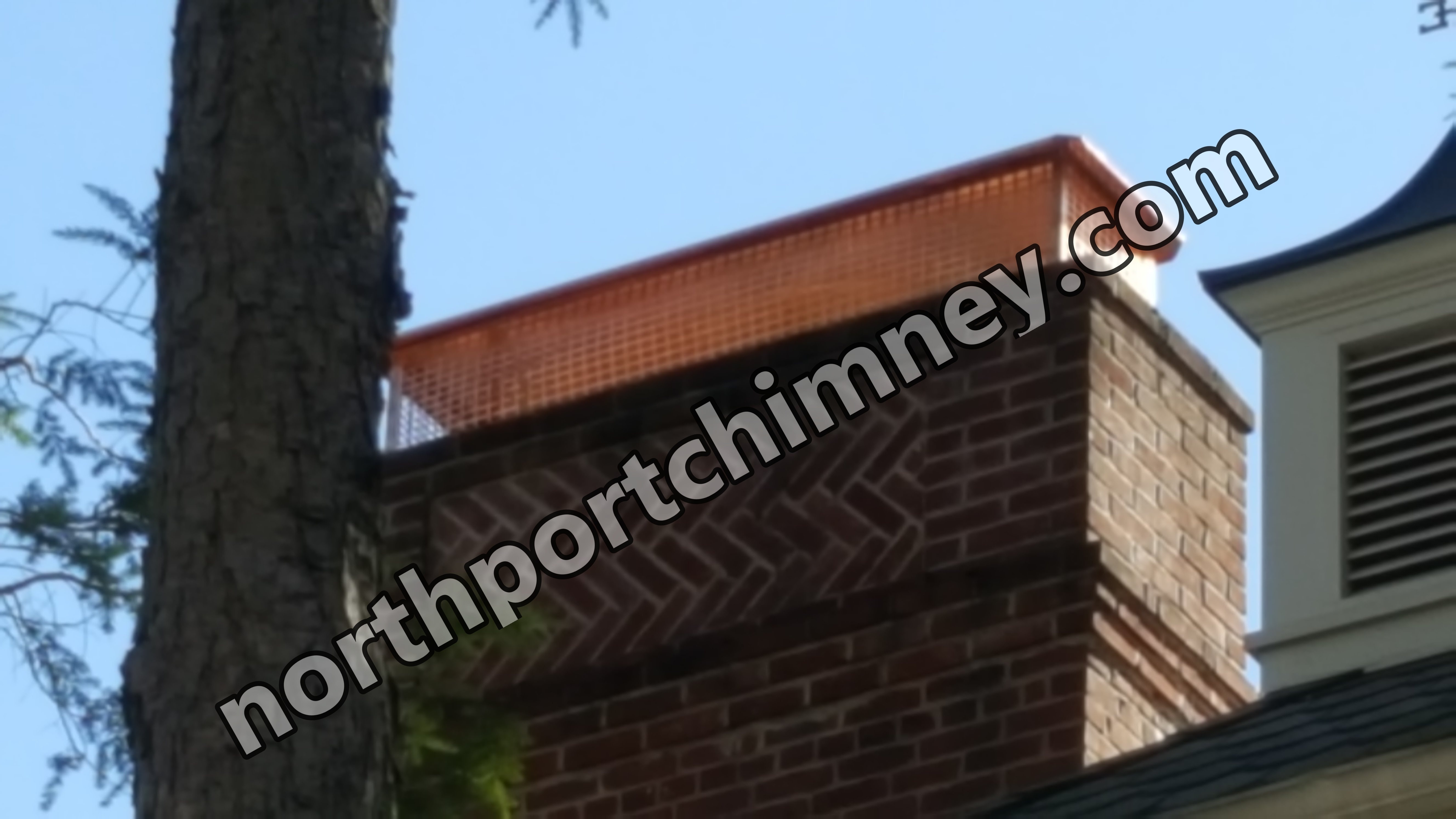 New stainless steel chimney cap installed in Northport, NY