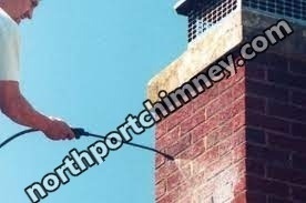 Carbon monoxide safety inspection on gas chimney in Northport, New York