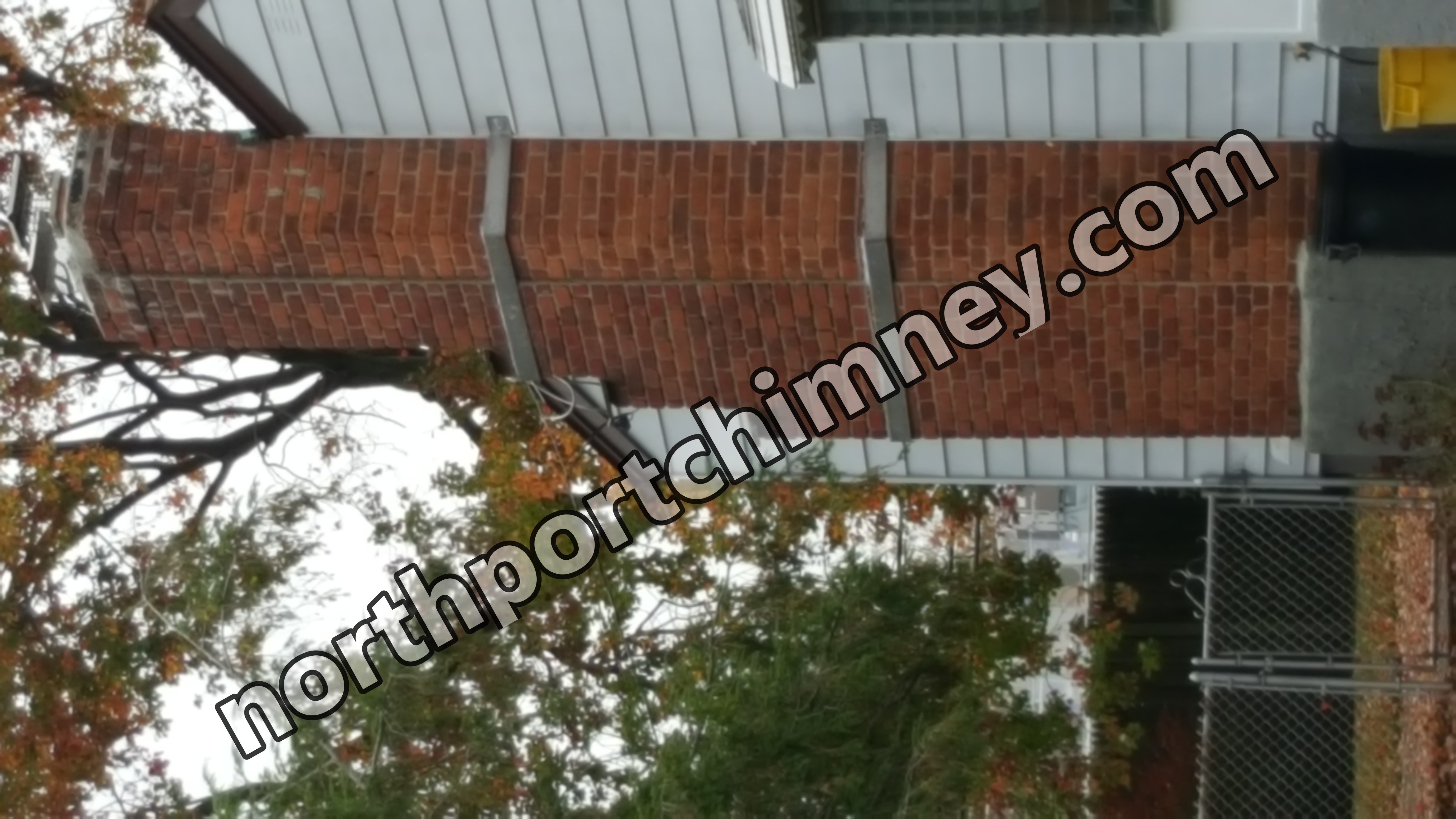 Heavy oil soot removal from chimney flue in Northport, New York